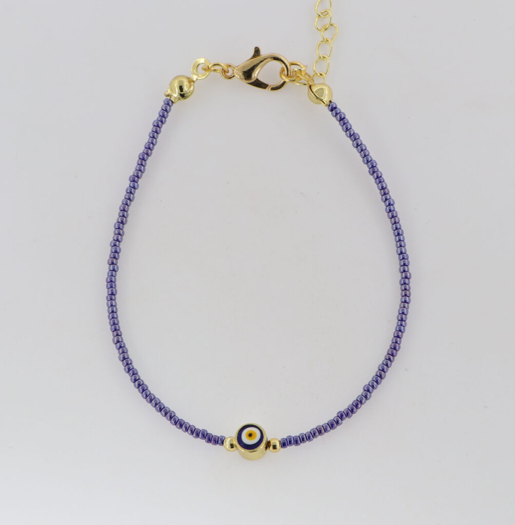 Βραχιόλι γυναικείο με μωβ σκούρες περλέ πέτρες