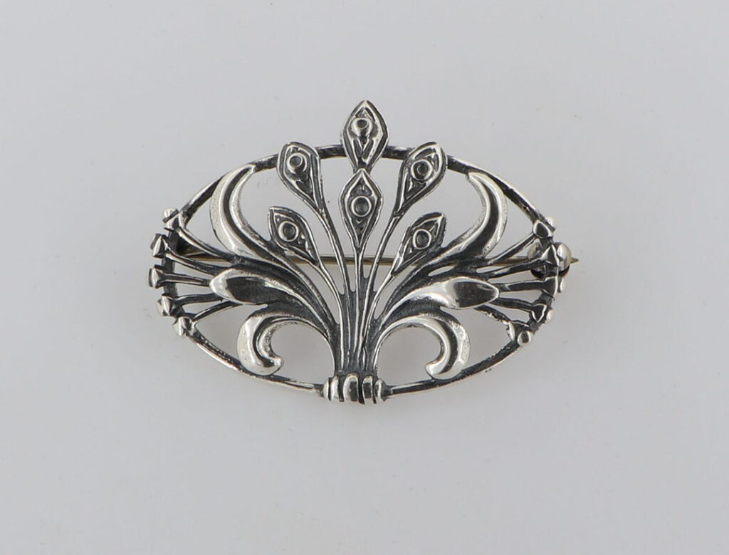 Καρφίτσα Ασημένια με λουλούδι σε στεφάνι